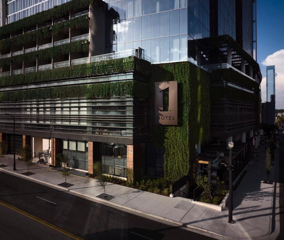 Living plant-covered facade and Harriet's Rooftop at 1 Hotel Nashville