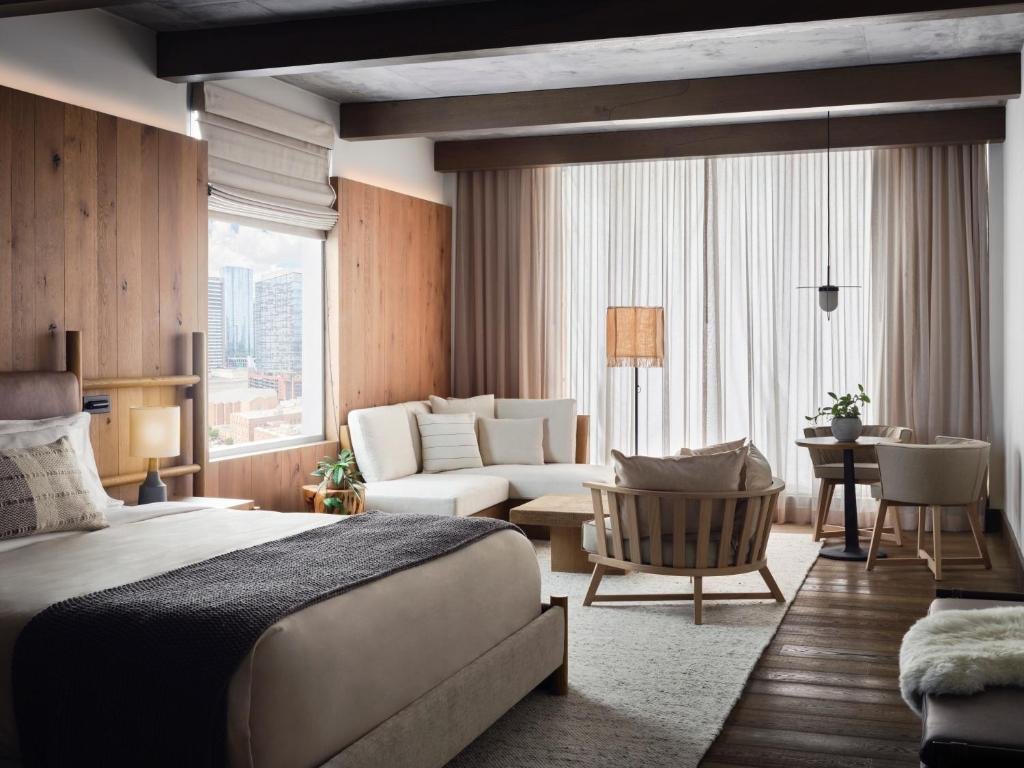 Organic reclaimed-wood luxury guest room at 1 Hotel Nashville