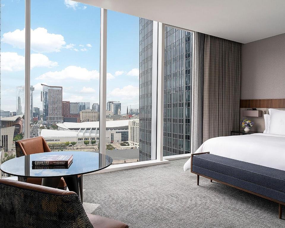 Luxury guest room with floor-to-ceiling windows at Four Seasons Hotel Nashville