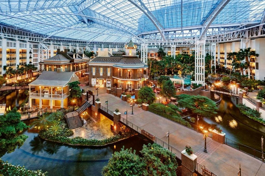 Indoor glass-enclosed botanical atrium and waterfalls at Gaylord Opryland Resort Nashville