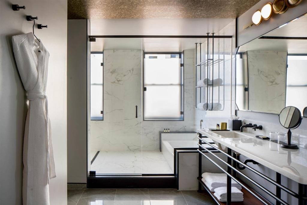 Art Deco boutique guest room with leather headboards at Holston House Nashville